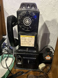 Antique Pay phone Telephone
