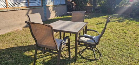 **5-Piece patio set **(2 swivel , 2 stationary chairs)