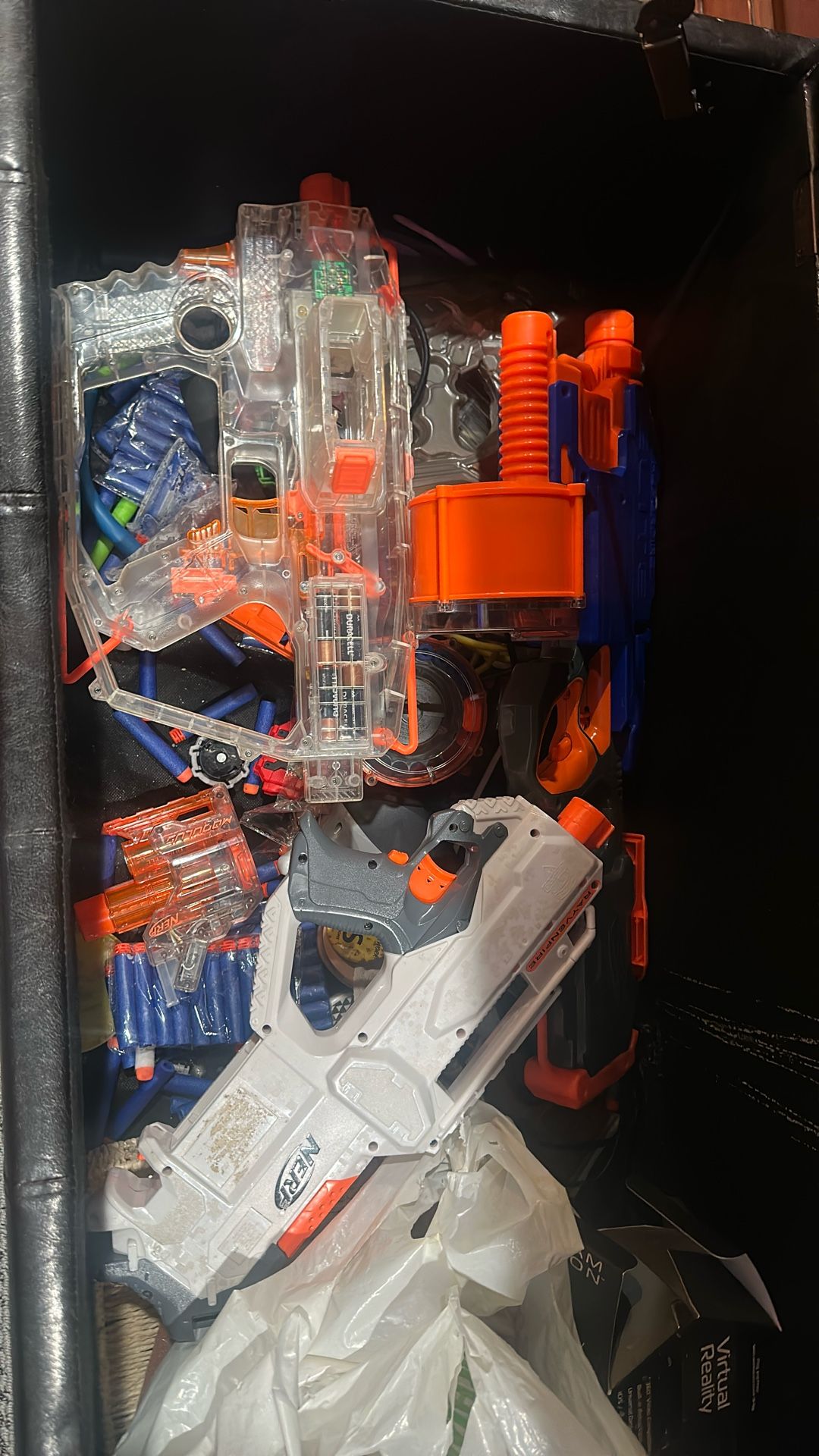 Box of Nerf Blasters With Extra Ammo and magazines 