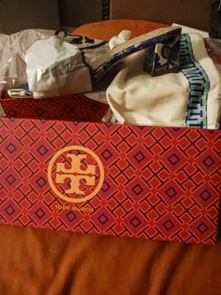 Tory Burch New small heel..new still in plastic size 5.5..very fancy beautiful shoe these r real cost 350.00 ..these r size 5.5