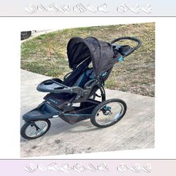 Children's Buggy Protected and Stylish for Today's Families behind top