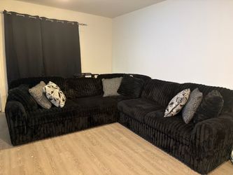 Midnight madness black sectional couch