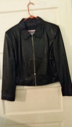 Wilson leather jacket .xtra L. Cash on hand,no change given. $60 firm. Dont ask for lower please.Firm!!!