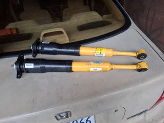 Pair of Yellow Shock Absorbers (off a dodge charger 2019)