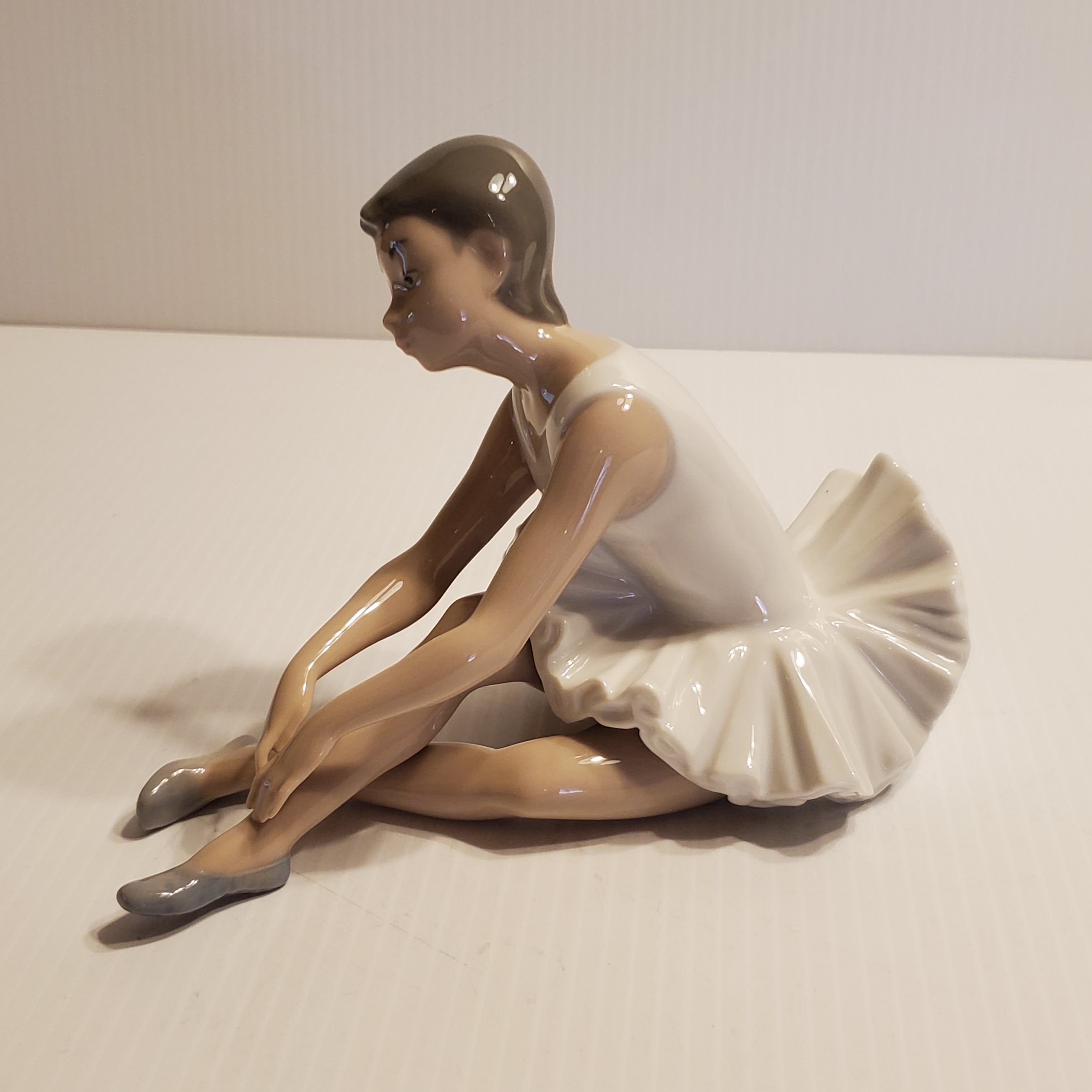 Vintage NAO by Lladro Figurine Ballerina Stretching sitting. Made in Spain.