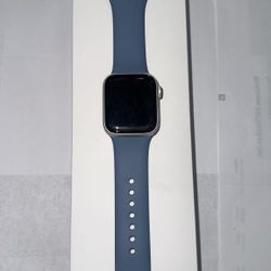 Apple Watch SE GPS, 44mm Silver Aluminum Case with Blue Sport Band for $225.