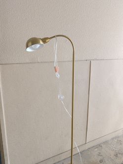 Sturdy gold color floor lamp