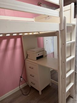 Bunk bed with desk on the bottom