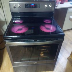 Reduced - Black Stainless And Black,  Whirlpool 5 Burner glass top stove with Self Cleaning Oven Works Excellent