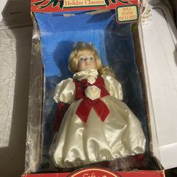 Soft expression porcelain holiday classic doll w/ stand