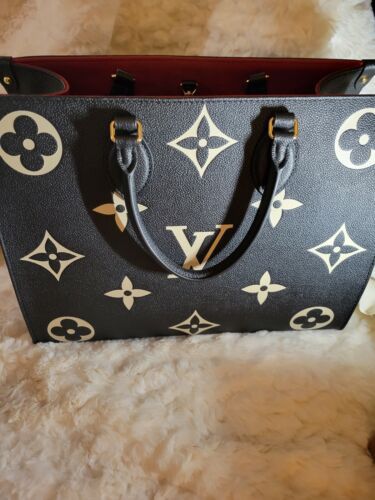 Louis Vuitton Empreinite Easy Pouch On Strap Black for Sale in Hillsboro,  OR - OfferUp