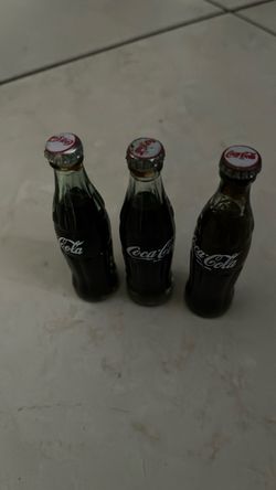 Vintage mini Coca-Cola bottles $35 for three