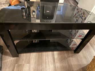 tinted glass TV stand