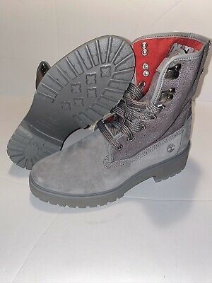 gray and red timberland boots