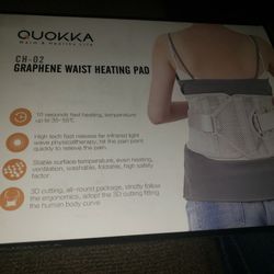 Waist heating pad lower back. Belt wrap with adjustable strap contoured for back pain relief