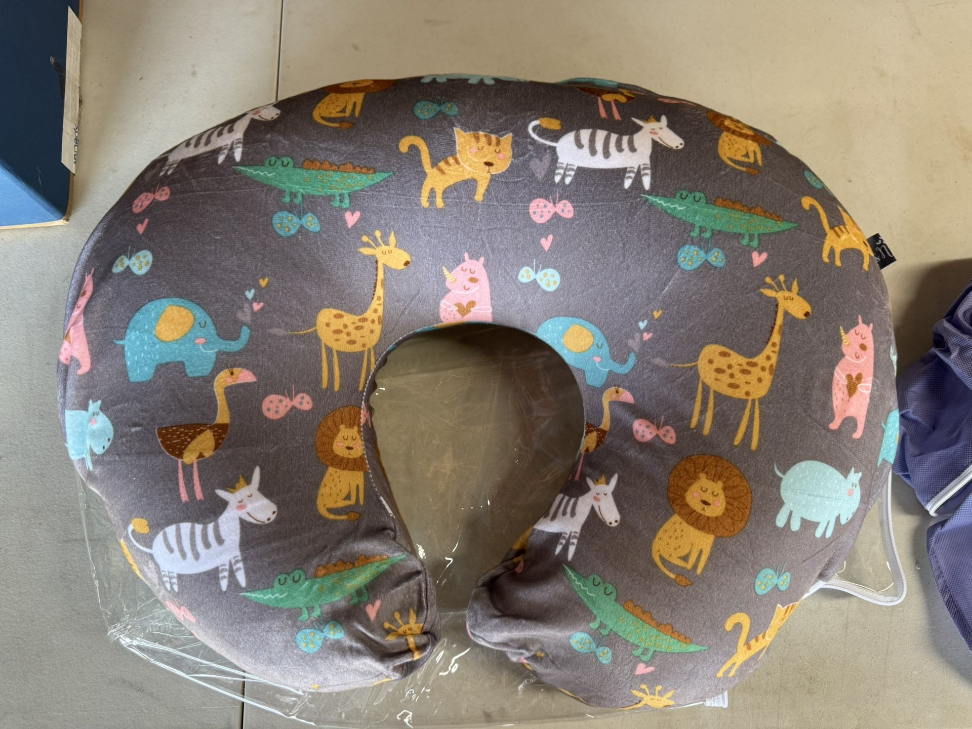 Boppy Bare Naked Original Nursing Pillow plus Kids N' Such Baby Nursing Pillow Cover Jungle Pattern (like new) Cover was purchased separately so you