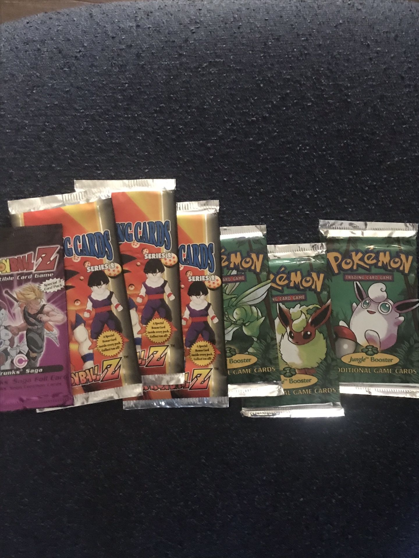 Unopened dragonball z and Pokémon cards