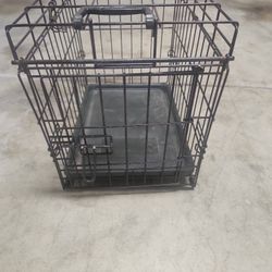 Petcage , eighteen inches by twelve inches with a handle and a flooring
