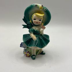 Antique southern Bell Figure In Green Outfit With Hat