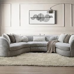Brand New Gorgeoues Curved Sectional upholstered in performance Boucle fabric. pillows included 