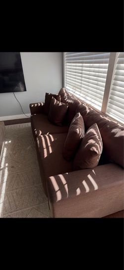 3 brown couches very large