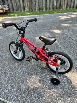 14” red kids bike with push handle and training wheels
