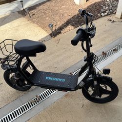 Electric Scooter- Brand Caroma 