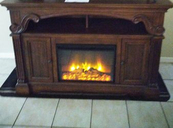 65 inch TV Stand with electric fire place.. With remote control