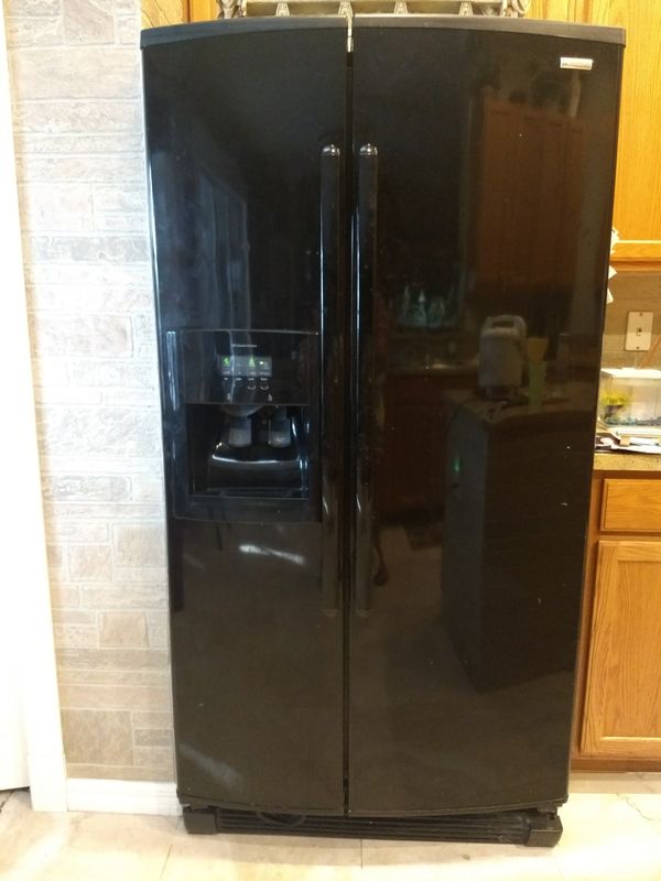 Kenmore elite side-by-side refrigerator with water filtration system