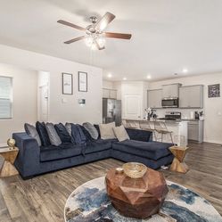 Sectional, Rug, And Coffee Table