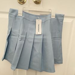 💙 FALDA PLIZADA - Talla “L”  $9 💙