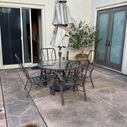 Patio Table, Chairs And Umbrella