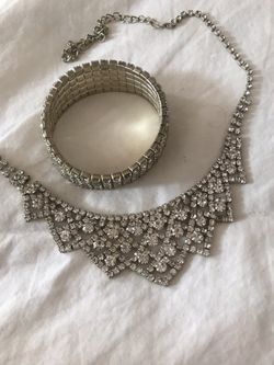 diamond necklace, bracelet and earrings