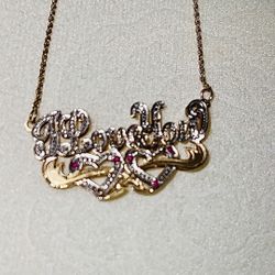 white & yellow 14K Gold I Love You Necklace w/ Ruby $400