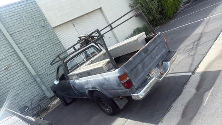 Wow! NEW MOTOR NEW TRANS TOO! Toyota work truck mpg