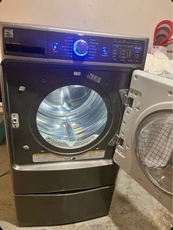 Gas front-load dryer on pedestal