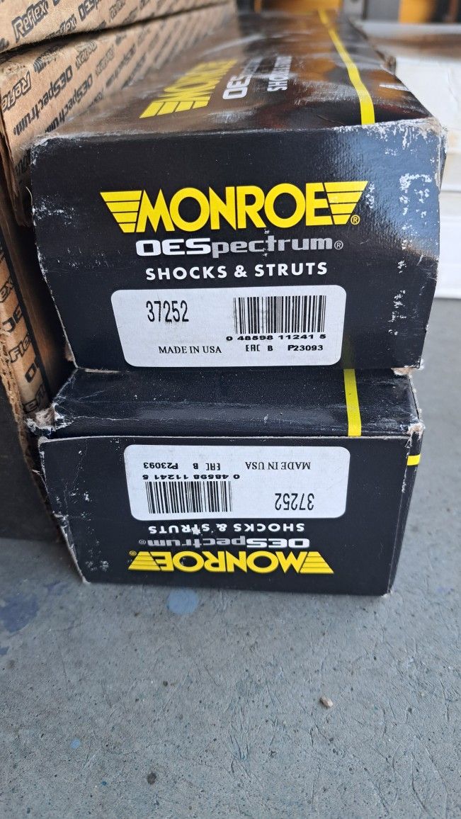 2004 Nissan Titan Struts, Rear Rotors, Rear Brake Pads.