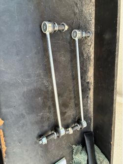 Front sway bars for vehicles