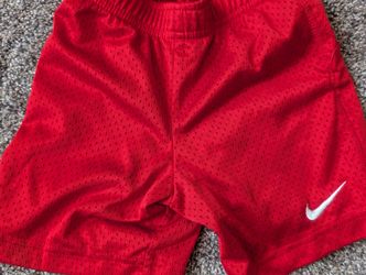 Boys Red Nike shorts size 4