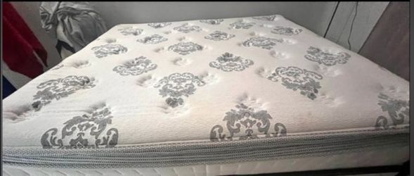 Brand new sealy king size pillowtop mattress and boxsprings.