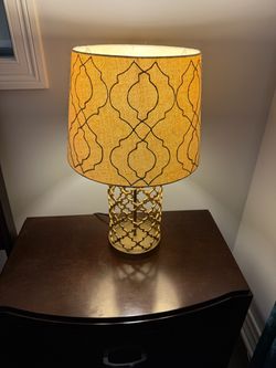 Two matching gold lamps