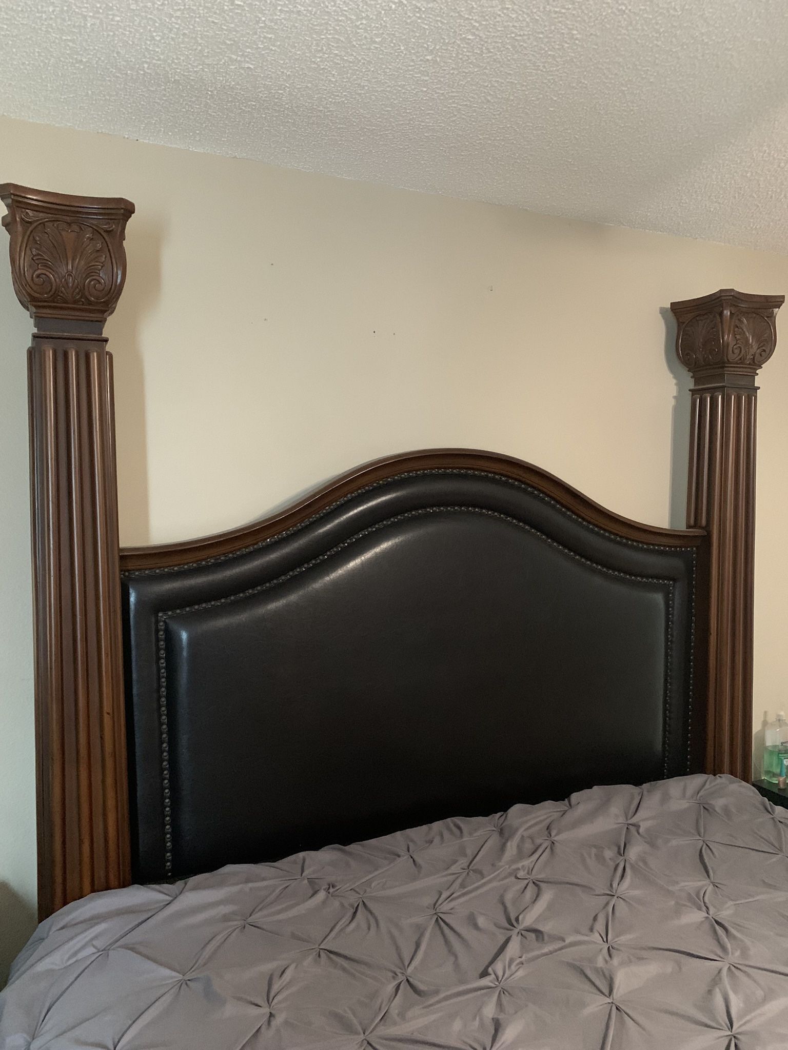"Sleep Like Royalty: Stunning King Size Hardwood Bed with Majestic Poles!