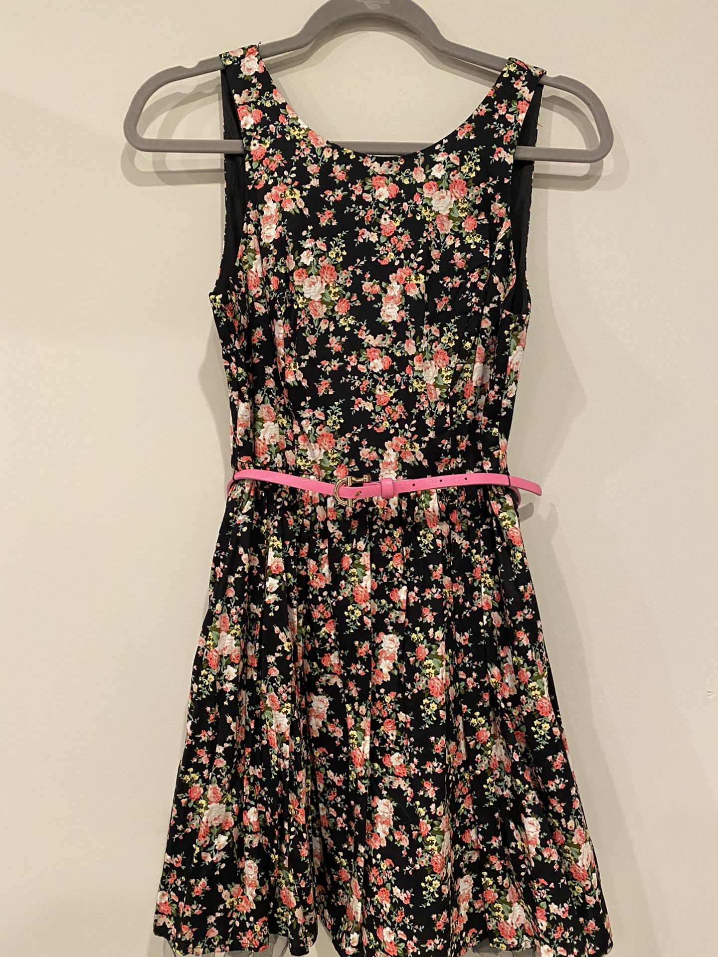 Black floral a-line dress with pink belt