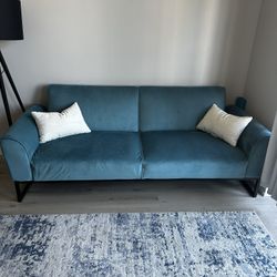  CosmoLiving by Cosmopolitan CosmoLiving Adley Coil, Medium Teal Velvet with Black Metal Base Futon