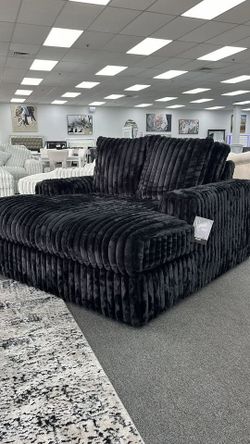  Wrapped in luxuriously soft jumbo corduroy, this oversized chaise