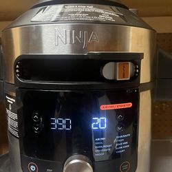 Ninja OL601 Foodi XL 8 Qt. Air fryer and Pressure Cooker Steam Fryer with SmartLid, 14-in-1