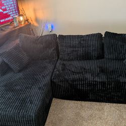 Lightly used sectional cloud couch black