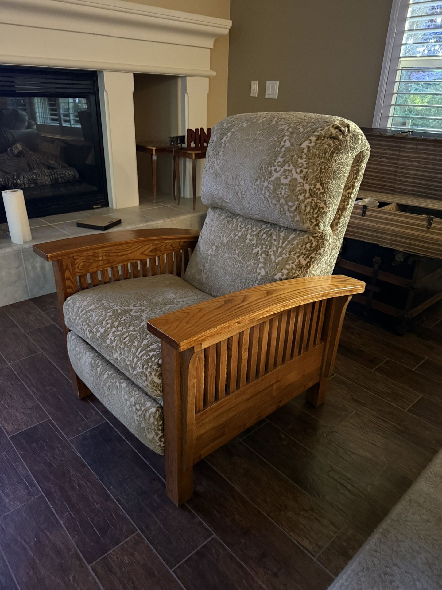 Wooden Recliner with Patterned Upholstery