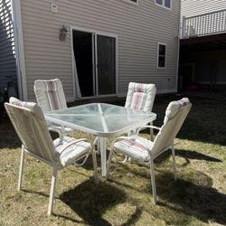 Patio Set Including Four Chairs