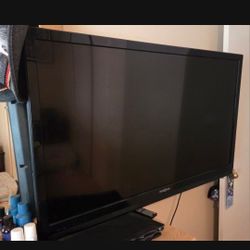 Two TV'S and an Entertainment Center